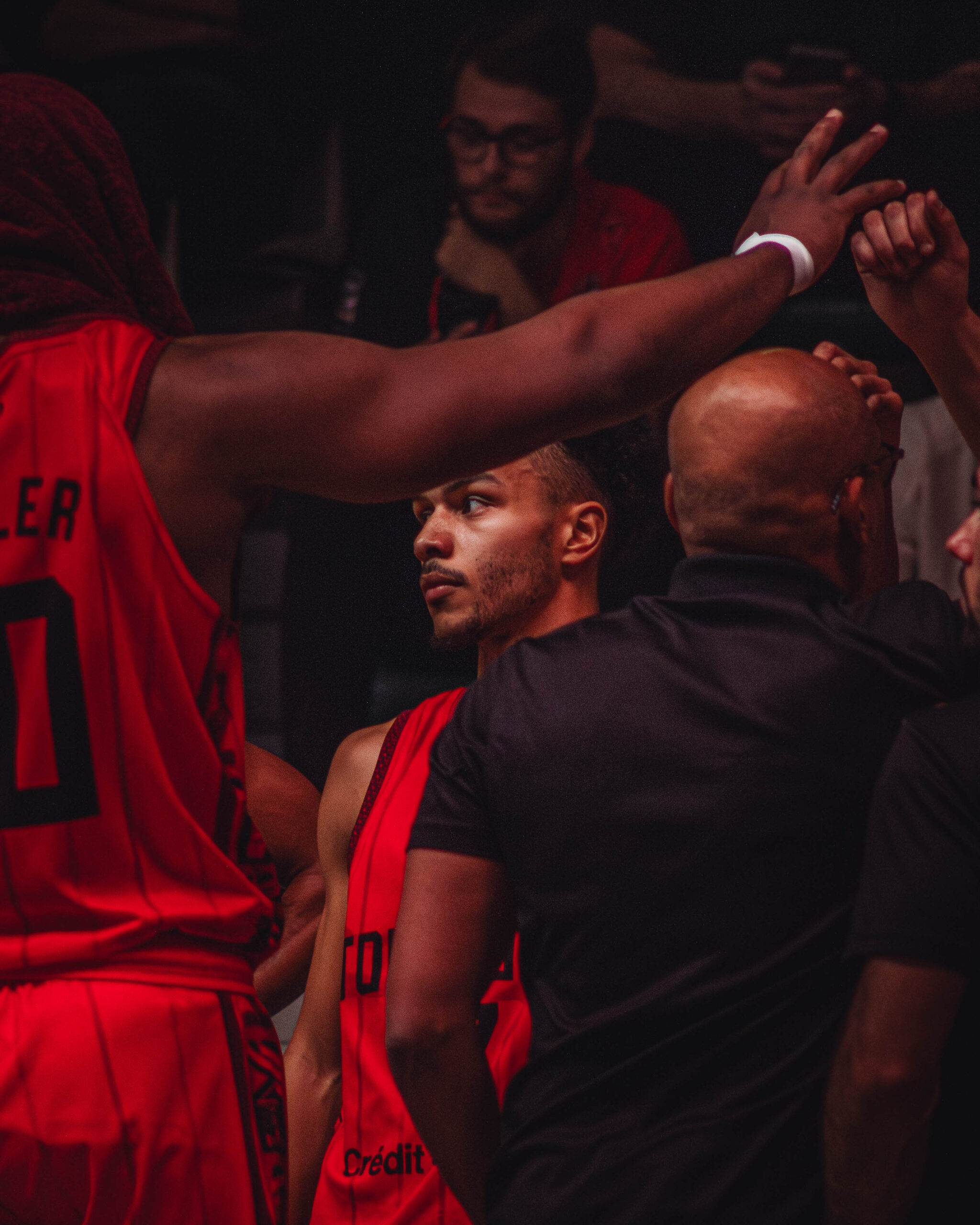 a group of men in basketball uniforms