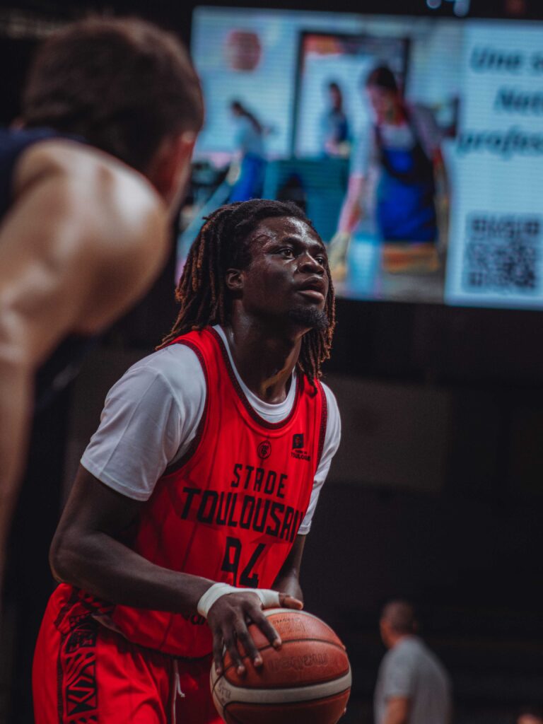 a man in a basketball uniform
